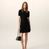 Abito mini a godet in maglia nera