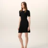 Abito mini a godet in maglia nera