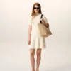 Abito mini Godet in maglia bianca