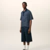 Ami de Coeur Polo a righe in cotone blu Ami de Coeur Polo a righe in cotone blu