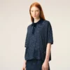 Ami de Coeur Polo a righe in cotone blu Ami de Coeur Polo a righe in cotone blu