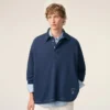 Ami de Coeur Polo blu a maniche lunghe in cotone Ami de Coeur Polo blu a maniche lunghe in cotone