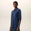 Ami de Coeur Polo in cotone blu con toppa in maglia