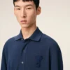 Ami de Coeur Polo in cotone blu con toppa in maglia