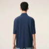 Ami de Coeur Polo in cotone blu con toppa in maglia