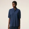 Ami de Coeur Polo in cotone blu con toppa in maglia