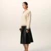 Ami de Coeur Sweater in lana a coste con scollo a V bianco