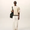 Ami de Coeur Sweater in lana a coste con scollo a V bianco