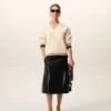 Ami de Coeur Sweater in lana a coste con scollo a V bianco