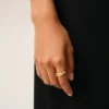 Anello in treccia di ottone dorato