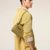 Borsa Mimi piccola in pelle di vacchetta verde Borsa Mimi piccola in pelle di vacchetta verde