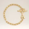 Bracciale Ami de Coeur in ottone dorato martellato