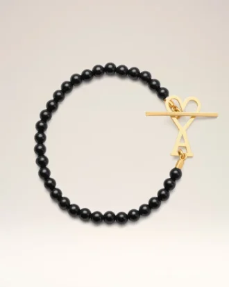 Bracciale Ami De Cœur in ottone nero con perle estive dorate