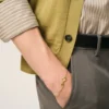 Bracciale sottile martellato Ami de Coeur in ottone dorato Bracciale sottile martellato Ami de Coeur in ottone dorato