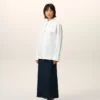 Camicia aderente in cotone bianco con colletto a punta Camicia aderente in cotone bianco con colletto a punta