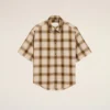 Camicia Ami de Coeur a quadri beige dal taglio squadrato in tela Camicia Ami de Coeur a quadri beige dal taglio squadrato in tela