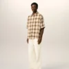 Camicia Ami de Coeur a quadri beige dal taglio squadrato in tela Camicia Ami de Coeur a quadri beige dal taglio squadrato in tela