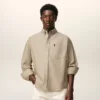 Camicia Ami de Coeur in cotone beige dal taglio squadrato con ricami Camicia Ami de Coeur in cotone beige dal taglio squadrato con ricami