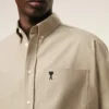 Camicia Ami de Coeur in cotone beige dal taglio squadrato con ricami Camicia Ami de Coeur in cotone beige dal taglio squadrato con ricami