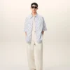 Camicia ampia Ami de Coeur a maniche corte in cotone a righe bianche Camicia ampia Ami de Coeur a maniche corte in cotone a righe bianche