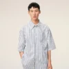 Camicia ampia Ami de Coeur a maniche corte in cotone a righe bianche Camicia ampia Ami de Coeur a maniche corte in cotone a righe bianche