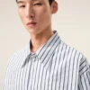 Camicia ampia Ami de Coeur a maniche corte in cotone a righe bianche Camicia ampia Ami de Coeur a maniche corte in cotone a righe bianche