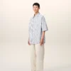Camicia ampia Ami de Coeur a maniche corte in cotone a righe bianche Camicia ampia Ami de Coeur a maniche corte in cotone a righe bianche