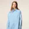 Camicia ampia Ami de Coeur in cotone blu con colletto a punta Camicia ampia Ami de Coeur in cotone blu con colletto a punta