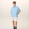 Camicia ampia Ami de Coeur in cotone blu con colletto a punta Camicia ampia Ami de Coeur in cotone blu con colletto a punta