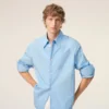 Camicia ampia Ami de Coeur in cotone blu con colletto a punta Camicia ampia Ami de Coeur in cotone blu con colletto a punta