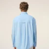 Camicia ampia Ami de Coeur in cotone blu con colletto a punta Camicia ampia Ami de Coeur in cotone blu con colletto a punta