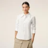 Camicia bianca aderente in misto seta con colletto a punta Camicia bianca aderente in misto seta con colletto a punta