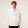Camicia bianca in cotone con colletto a punta e motivo Ami de Coeur Camicia bianca in cotone con colletto a punta e motivo Ami de Coeur