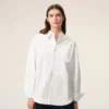 Camicia bianca in cotone con colletto a punta e motivo Ami de Coeur Camicia bianca in cotone con colletto a punta e motivo Ami de Coeur