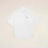 Camicia bianca in cotone dal taglio squadrato con ricamo Ami de Coeur Camicia bianca in cotone dal taglio squadrato con ricamo Ami de Coeur