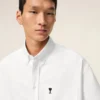 Camicia bianca in cotone dal taglio squadrato con ricamo Ami de Coeur Camicia bianca in cotone dal taglio squadrato con ricamo Ami de Coeur