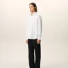 Camicia bianca in cotone su misura con ricamo Ami de Coeur Camicia bianca in cotone su misura con ricamo Ami de Coeur