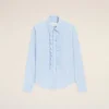 Camicia blu in cotone a maniche lunghe con volant e vestibilità aderente