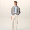 Camicia blu in cotone a maniche lunghe con volant e vestibilità aderente