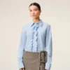 Camicia blu in cotone a maniche lunghe con volant e vestibilità aderente Camicia blu in cotone a maniche lunghe con volant e vestibilità aderente