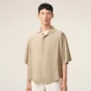 Camicia boxy Ami Paris ricamata a maniche corte beige Camicia boxy Ami Paris ricamata a maniche corte beige