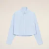 Camicia corta in cotone blu con motivo Ami de Coeur in rilievo Camicia corta in cotone blu con motivo Ami de Coeur in rilievo