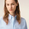 Camicia corta in cotone blu con motivo Ami de Coeur in rilievo Camicia corta in cotone blu con motivo Ami de Coeur in rilievo