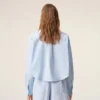 Camicia corta in cotone blu con motivo Ami de Coeur in rilievo Camicia corta in cotone blu con motivo Ami de Coeur in rilievo