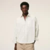 Camicia squadrata Ami de Coeur in cotone a righe bianche Camicia squadrata Ami de Coeur in cotone a righe bianche