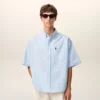 Camicia squadrata in cotone blu con ricami Ami de Coeur Camicia squadrata in cotone blu con ricami Ami de Coeur