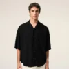 Camicia squadrata nera a maniche corte ricamata Ami Paris Camicia squadrata nera a maniche corte ricamata Ami Paris