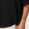 Camicia squadrata nera a maniche corte ricamata Ami Paris Camicia squadrata nera a maniche corte ricamata Ami Paris