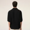 Camicia squadrata nera a maniche corte ricamata Ami Paris Camicia squadrata nera a maniche corte ricamata Ami Paris
