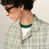 Camicia verde a quadri in cotone dal taglio squadrato Camicia verde a quadri in cotone dal taglio squadrato